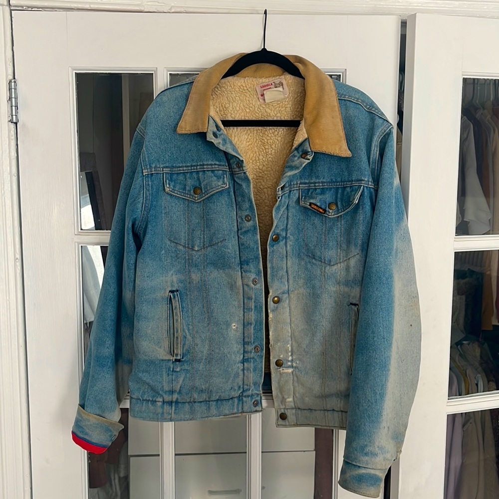 Distressed denim jacket with shearling interior